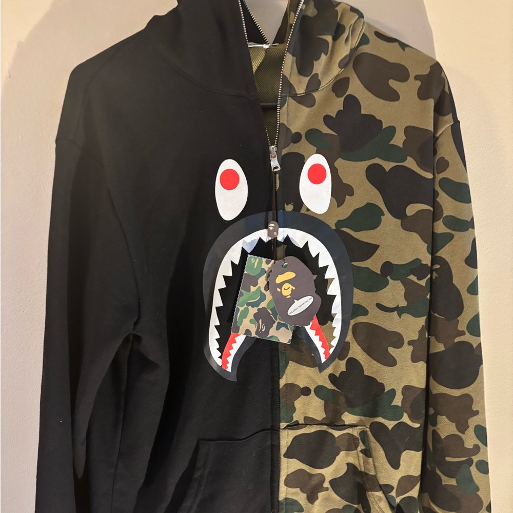 A Bathing Ape Green Camo and Black Split Design Jacket with Cartoon shark face
